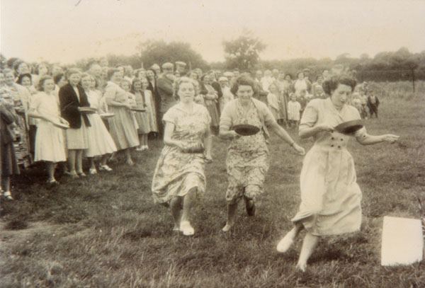 Copy of a ladies pancake tossing race